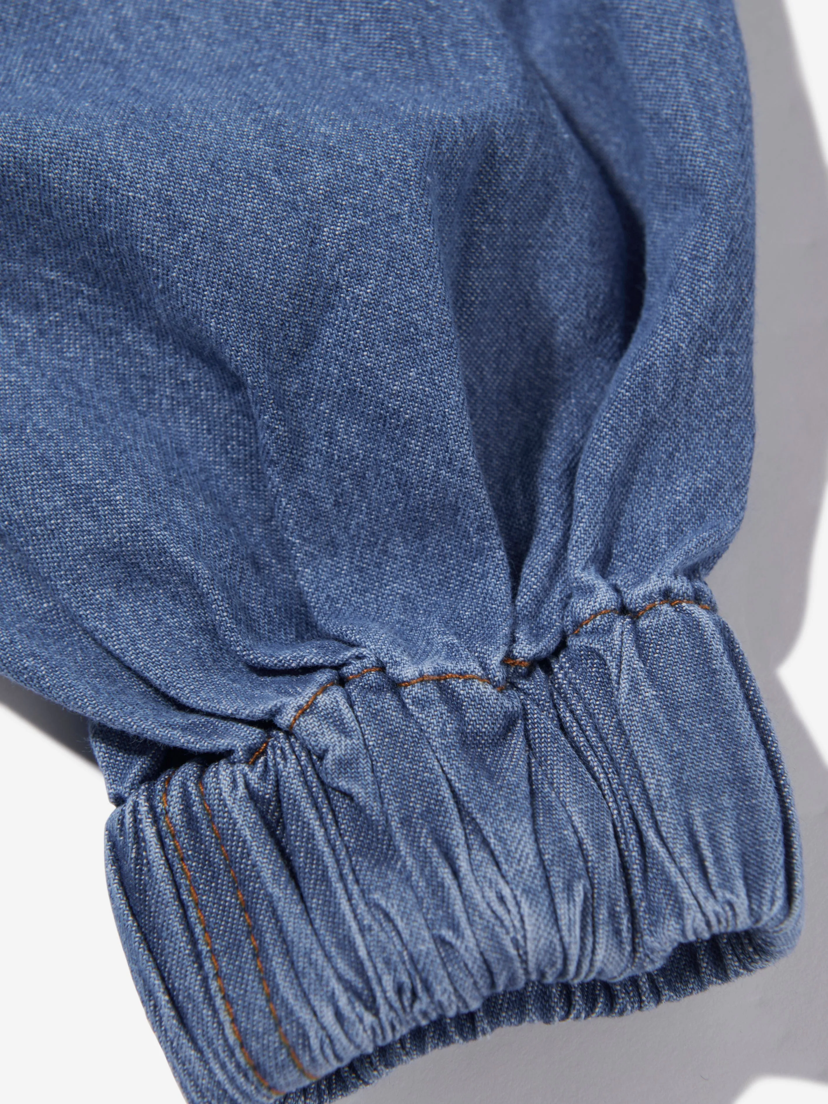 Molo Girls Washed Chambray Trousers in Blue